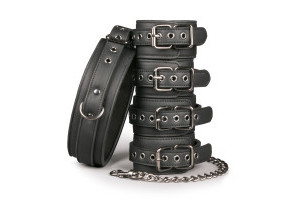 Fetish set with collar, ankle- and wrist cuffs